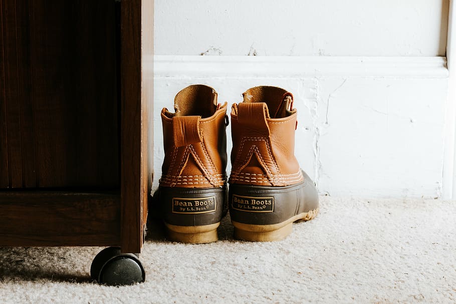 HD wallpaper: pair of brown leather boots beside cabinet, shoes ...