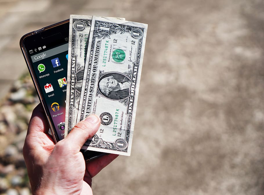 person holding black Android smartphone, mobile phone, money