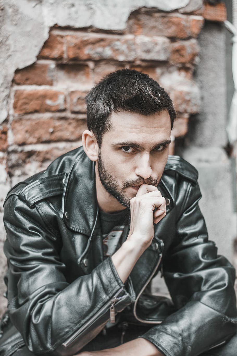 Young Handsome Man In Classic Leather Jacket Pose In Summer Garden. Stock  Photo, Picture and Royalty Free Image. Image 141225237.
