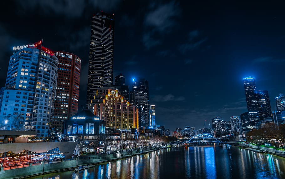 body of water near high-rise buildings, photography of high-rise buildings during nighttime, HD wallpaper