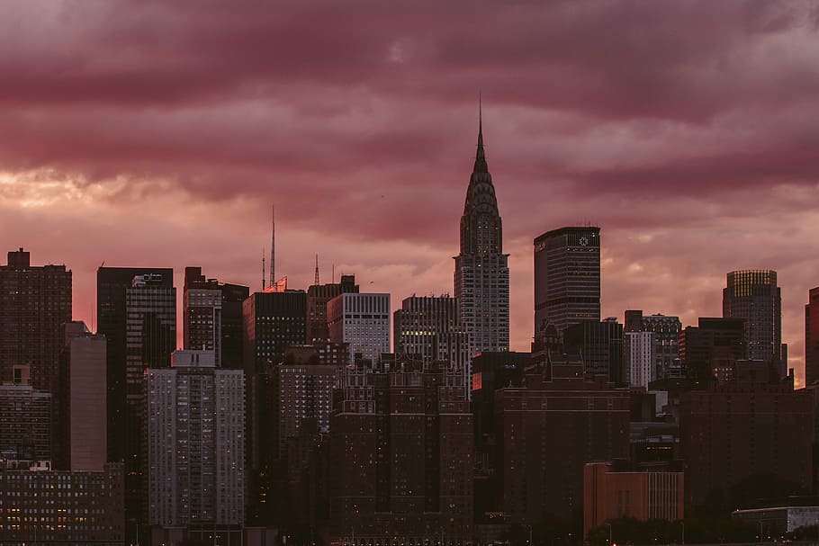 high rise buildings during golden time, landscape of city buildings during dusk HD wallpaper