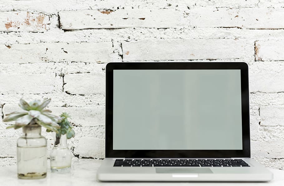 turned off MacBook Pro near clear glass bottle, laptop, apple HD wallpaper