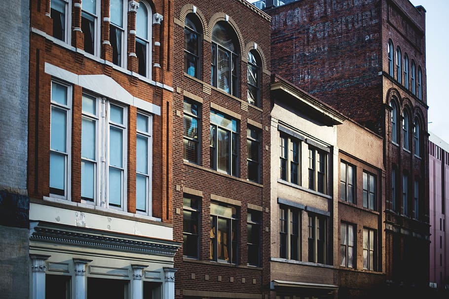 brown building beside buildings, architecture, infrastructure HD wallpaper