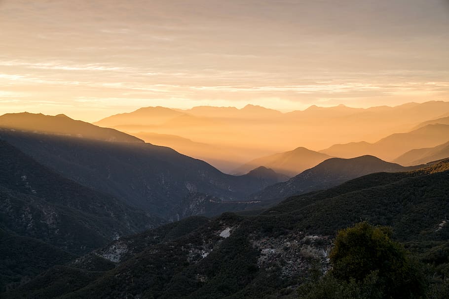 top view mountain covered with fog, aerial photography of mountain range under golden hour HD wallpaper