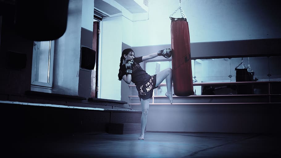 woman punching red heavy bag, kickboxer, girl, moscow, thai HD wallpaper