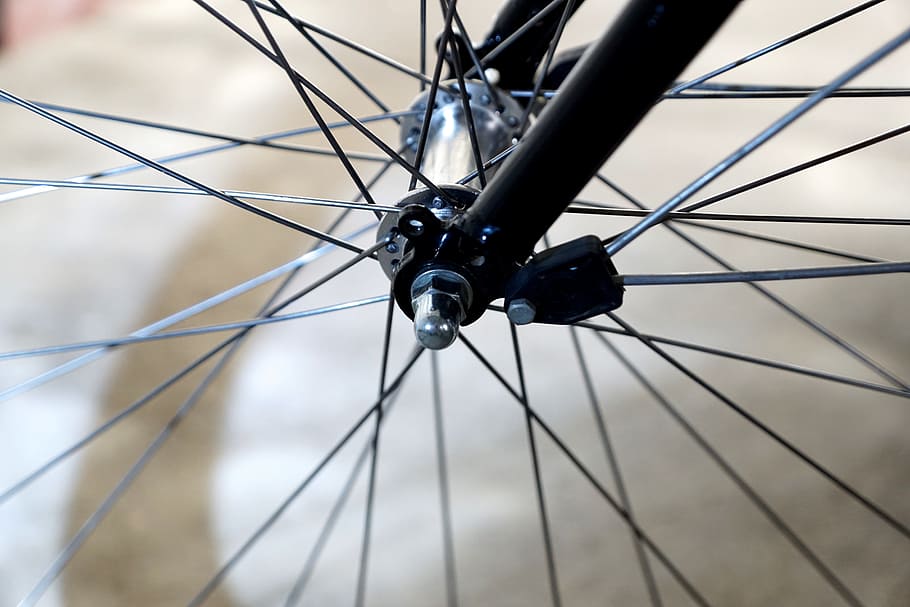 macro photo of bicycle rim, bike, velo, front wheel, hub, fixing