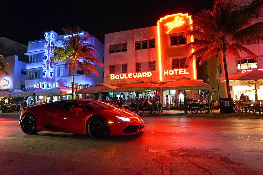 red Lamborghini Huracan parked near Boulevard Hotel building, HD wallpaper