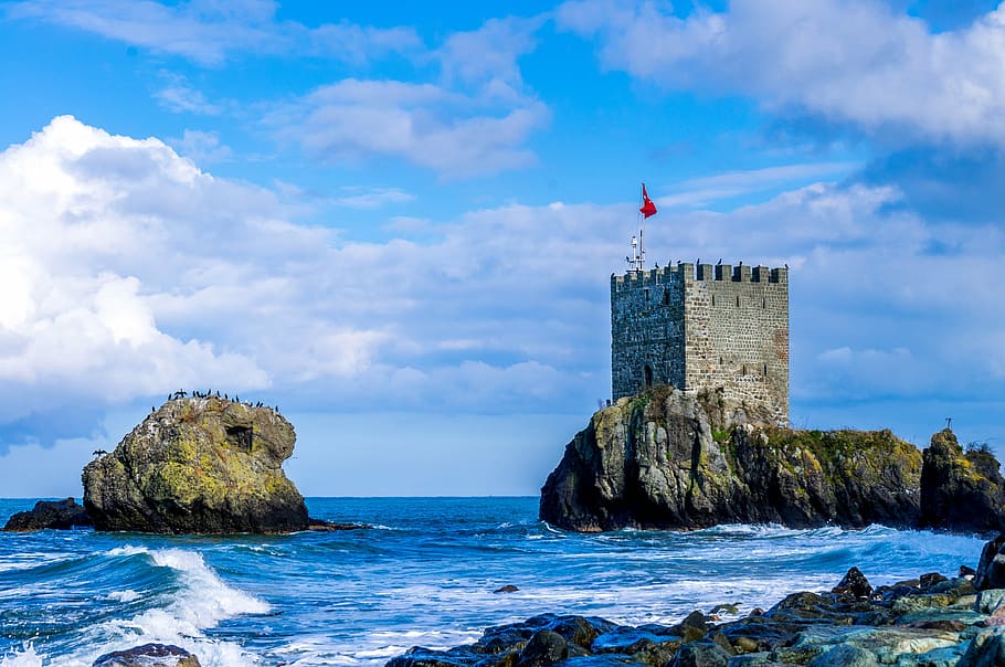 castle tower on cliff, girl, waves, clouds, flag, date-residue HD wallpaper