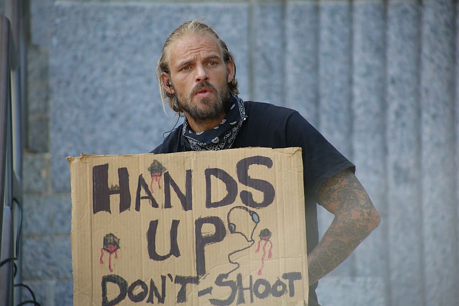 man holding hands up don't shoot signage, protest, outside HD wallpaper