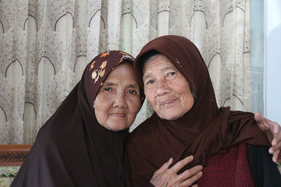 two woman sitting wearing hijabs, grandmother, old, face, people
