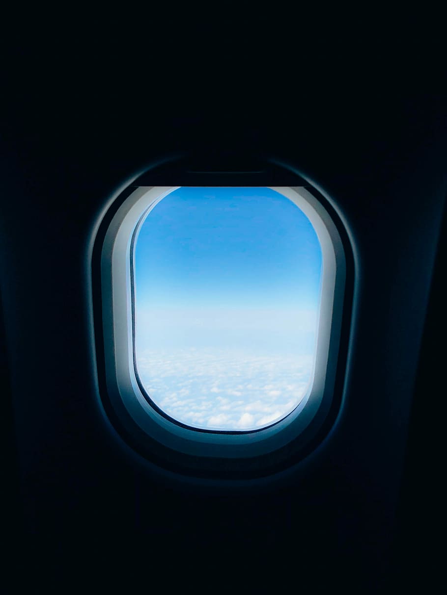 plane's window displaying clouds, selective focus photography of airplane window HD wallpaper