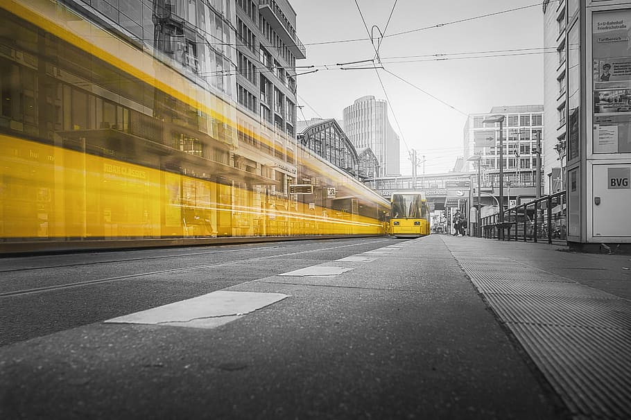 yellow bus near building, long exposure, day, movement, tram HD wallpaper