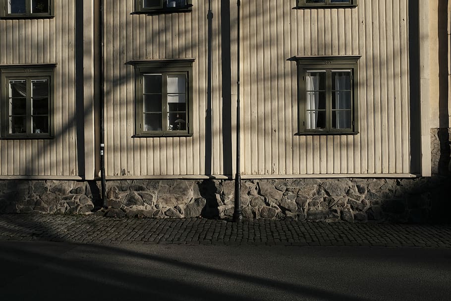 white wooden house, black metal post near white wooden house HD wallpaper