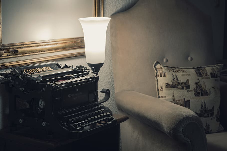 black Continental typewriter on brown wooden end table, technology HD wallpaper