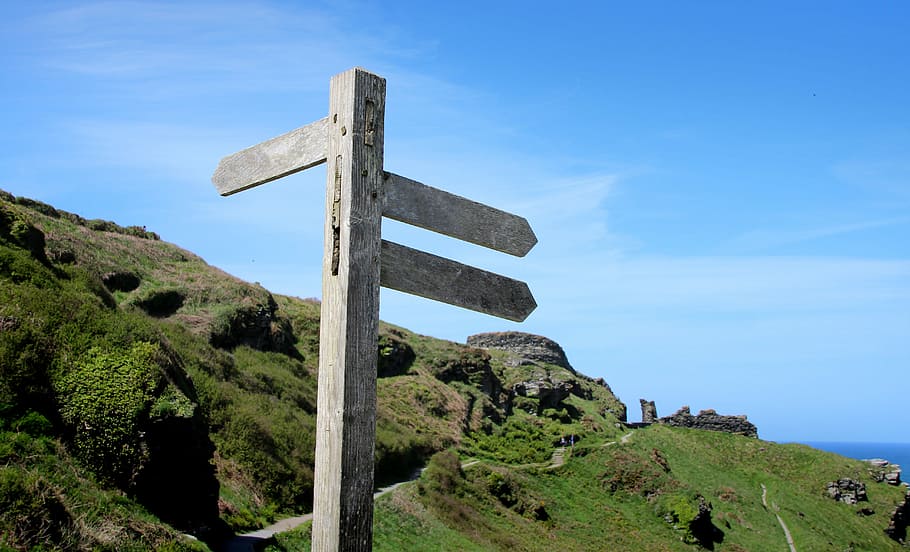 road signage near mountain during daytime, directory, direction HD wallpaper