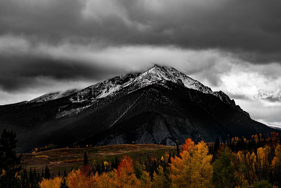 black mountain near trees under cloudy sky, photo of mountain near trees HD wallpaper