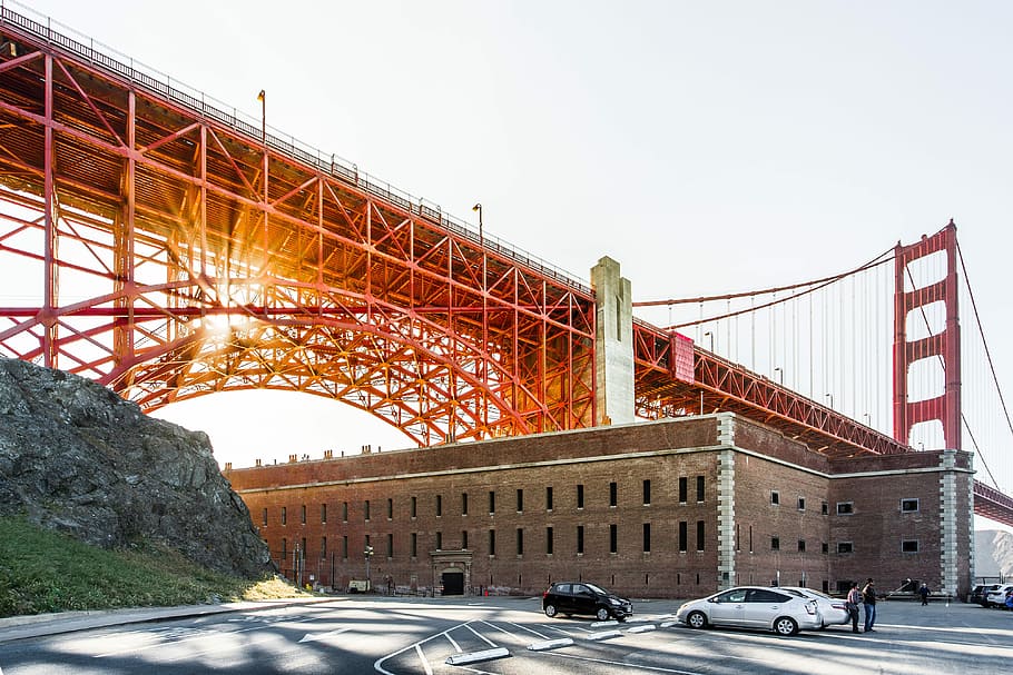brown concrete building under bridge, Golden Gate Bridge, New York HD wallpaper