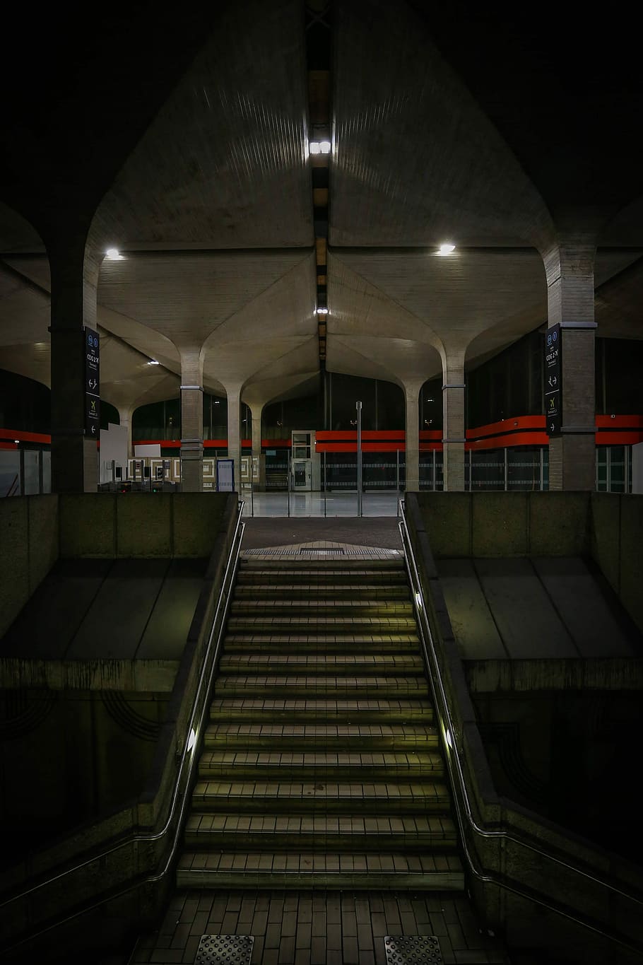 empty building at night time, stairway towards inside structure HD wallpaper