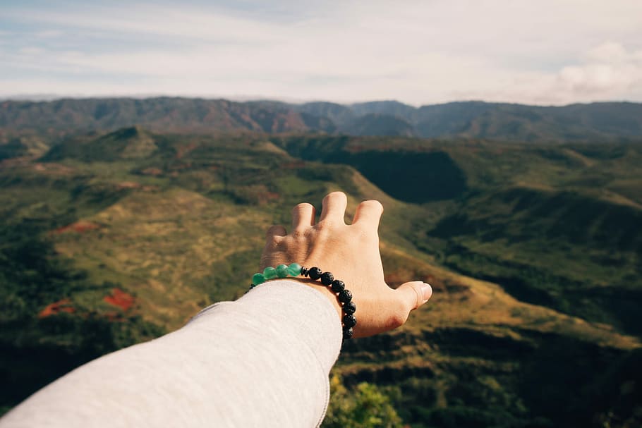 person wearing gray sweater and beaded black bracelet, hand HD wallpaper