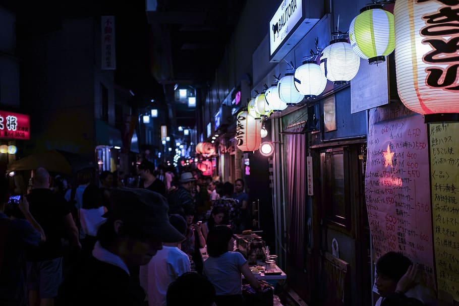 group of person outside, white ball lantern hanging under storefrunt HD wallpaper