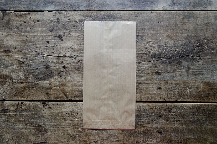 brown paper bag on brown wooden surface, blank, package, packaging, HD wallpaper