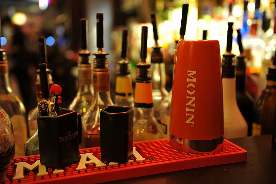 red Monin container on red plastic tray, cocktail, bar, drinks HD wallpaper