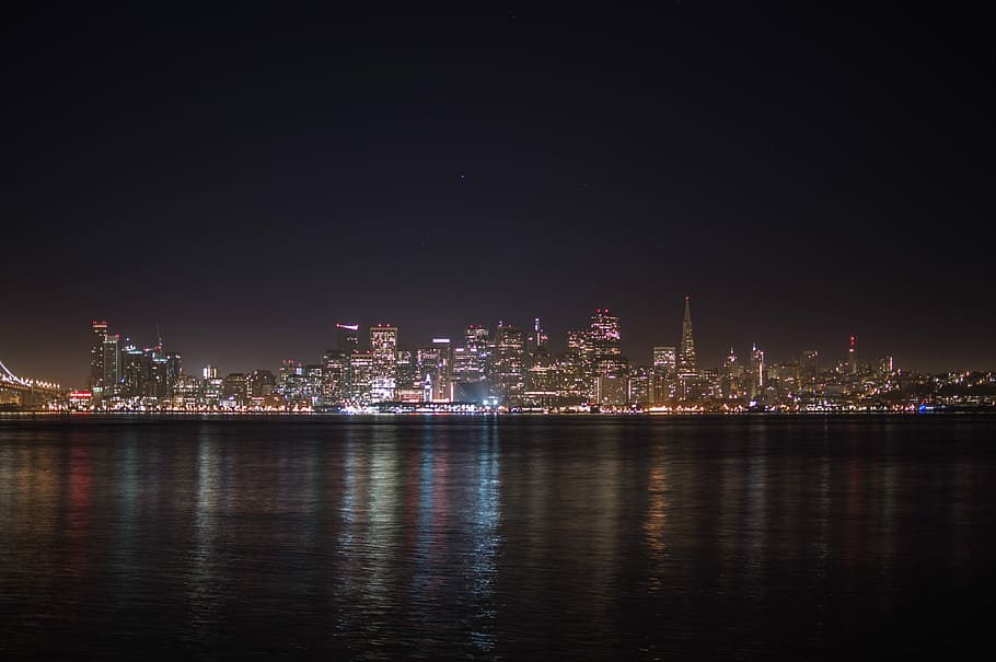 city skyline during night time, landscape photo of city building during night time HD wallpaper