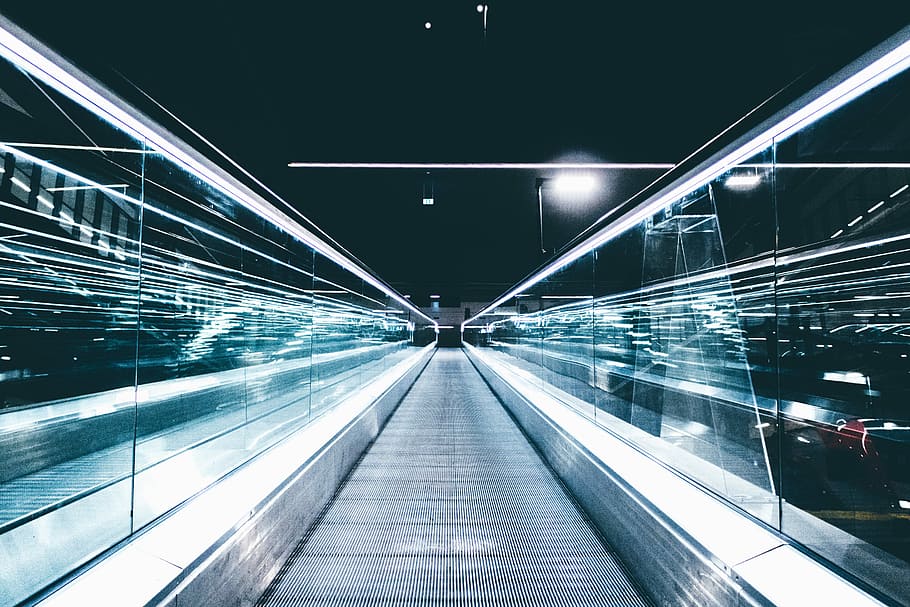 person taking photo of walkalator in time lapse photography, speed HD wallpaper