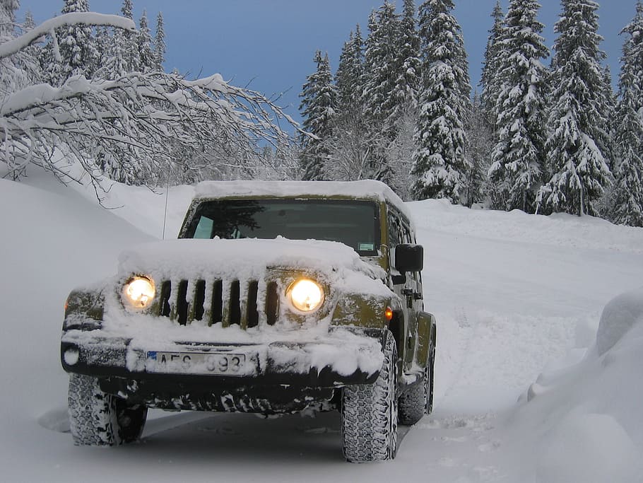green Jeep Wrangler on snowfield near trees, winter, car, auto, HD wallpaper
