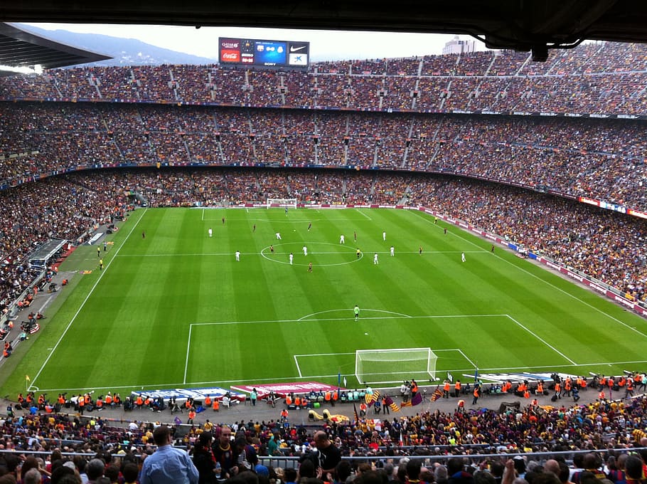 photo of soccer game inside stadium, estadio, camp nou, barcelona