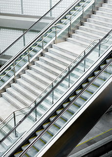 architecture photography of staircase during daytime, gray and white stairs with stainless steel railings HD wallpaper