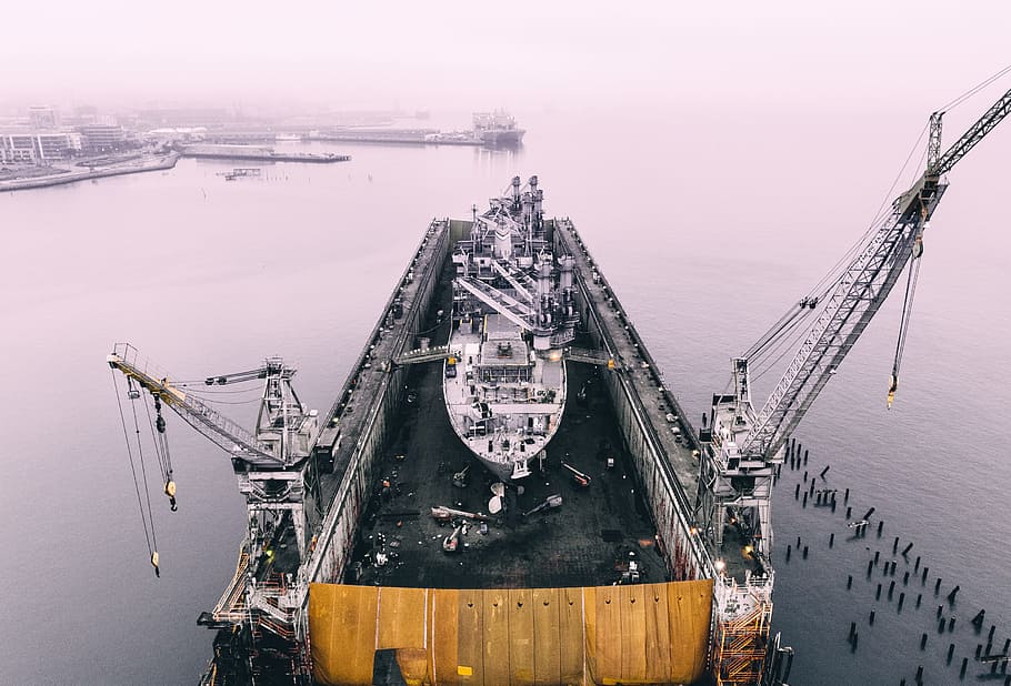 photo of ship on inside oil rig, making of cruise ship, selective color HD wallpaper