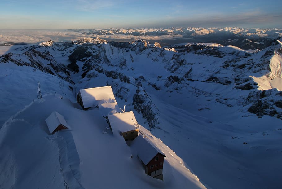 aerial photography of houses on snow-covered hill, mountain HD wallpaper