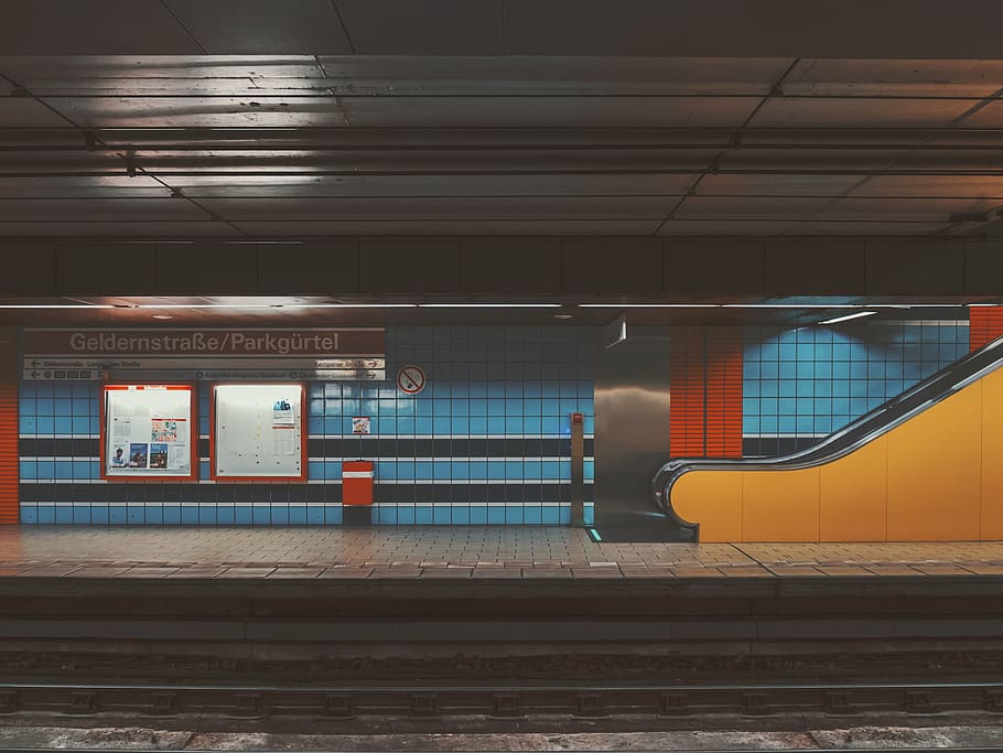 black escalator on train station, places, subway, blue, orange HD wallpaper