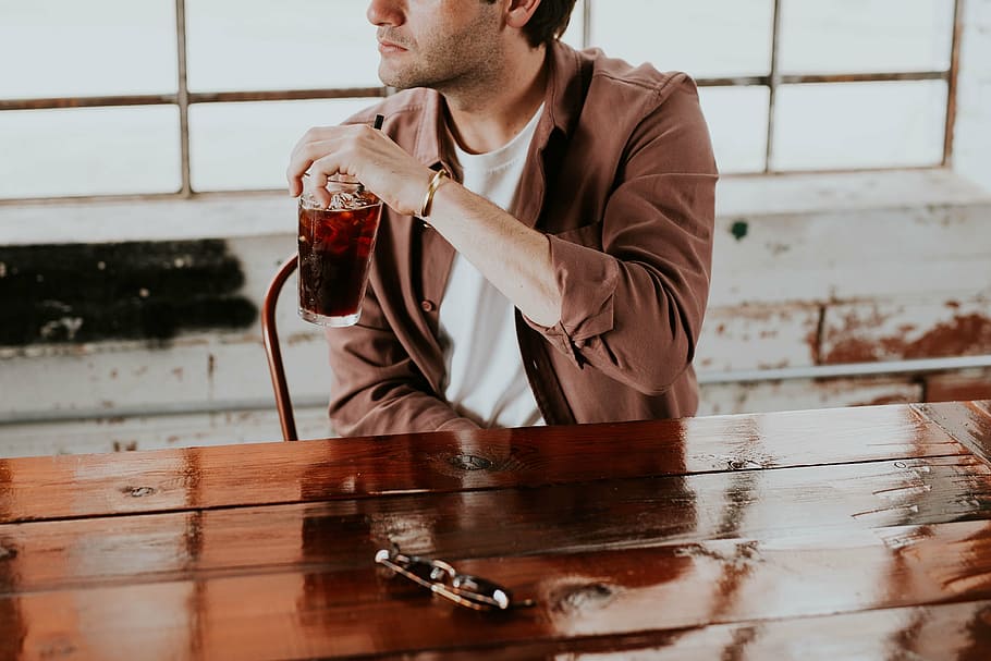 man in brown collared shirt sitting beside table, people, guy HD wallpaper