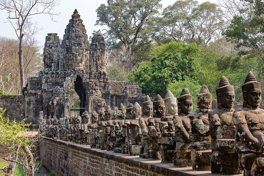 piled statues beside trees, angkor thom, angkor wat, cambodia, HD wallpaper