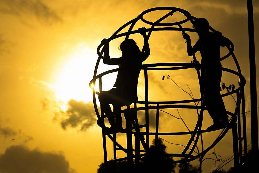 sunset, silhouette, dusk, sky, outdoors, light, energy, playing HD wallpaper