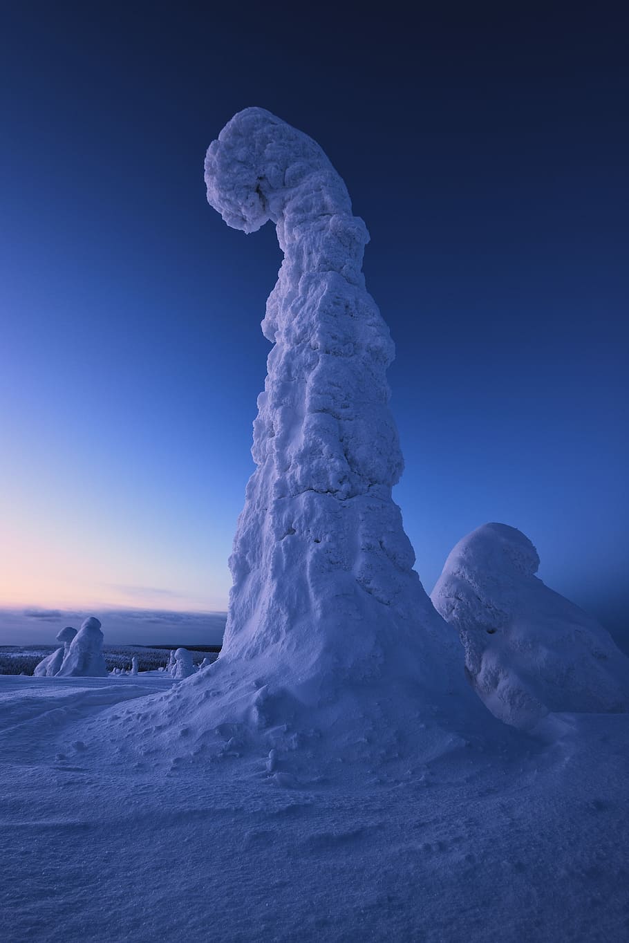 selective focus photography of butte, low angle photography of stone filled with snow HD wallpaper