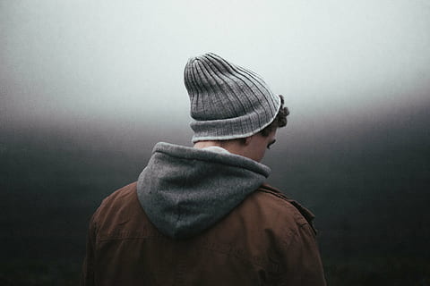 man facing back in gray room, wearing, knitted, cap, brown HD wallpaper