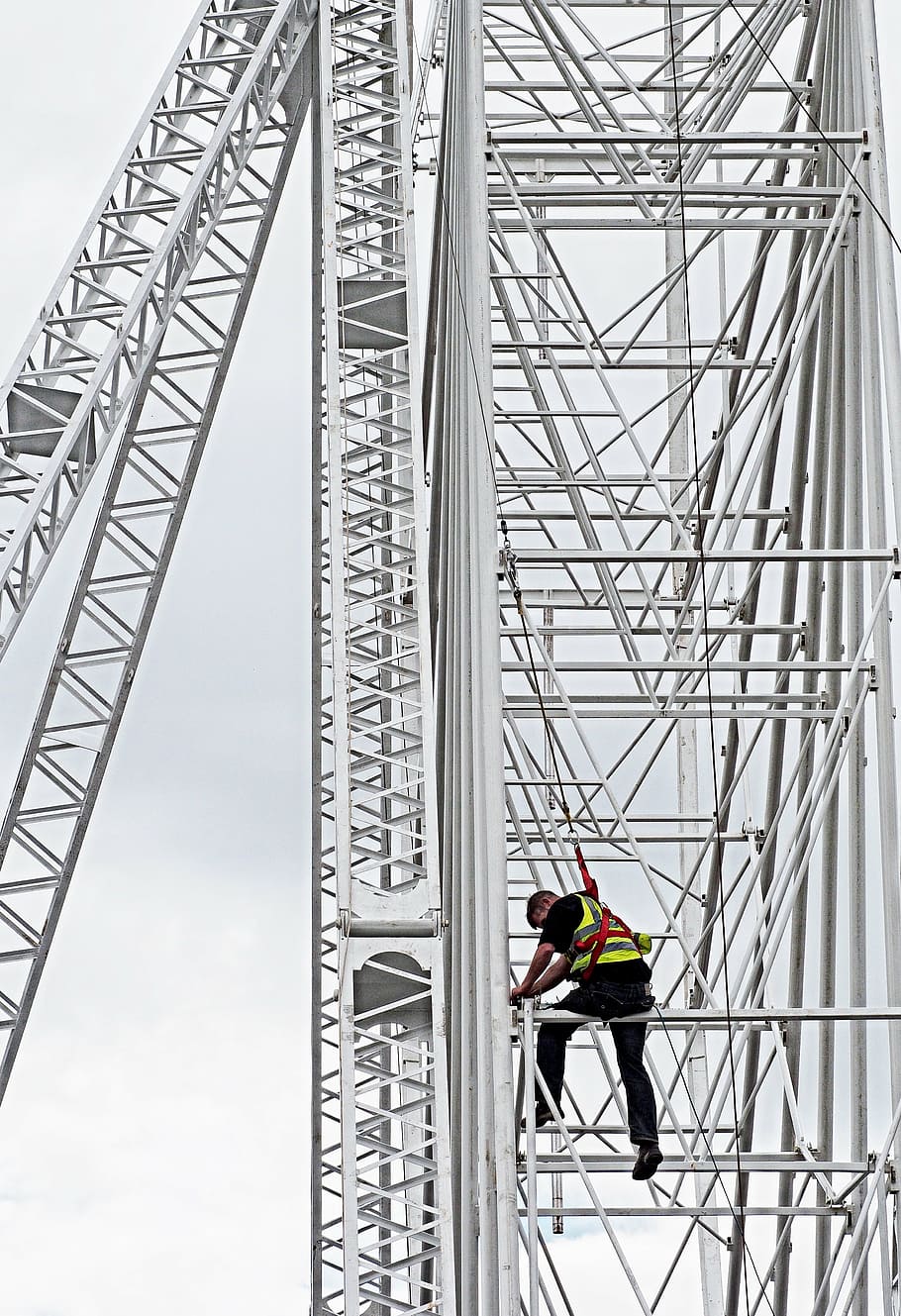 man climbing tower, construction, safety, danger, height, working