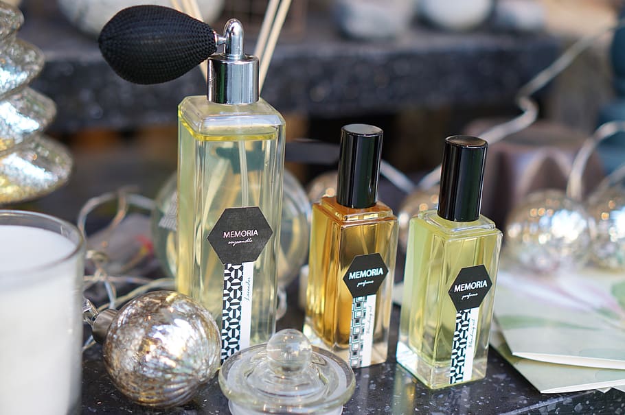three fragrance bottle on top of table, perfume, diffuser, fragrances HD wallpaper