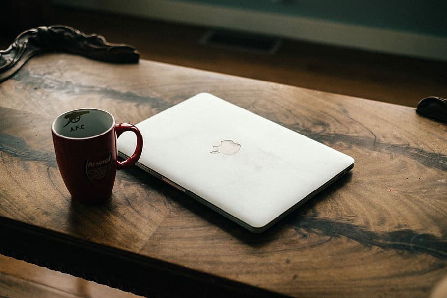 silver MacBook near red ceramic mug, silver MacBook near ceramic mug HD wallpaper