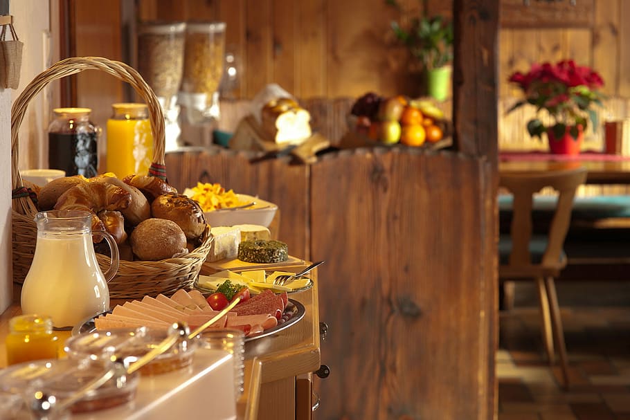 selective focus photography of pitcher filled with milk beside brown wicker basket, tilt-shift lens photography of prepared food on top of table HD wallpaper