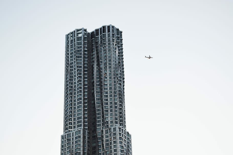 low-angle photo of building, plane near high raise building, architecture HD wallpaper