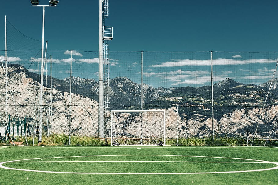The symmetry of soccer courts, white soccer goal, pitch, fence HD wallpaper