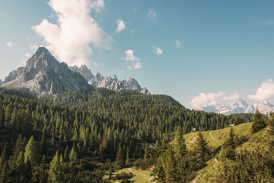 photo of mountain, mountain surrounding trees under cloudy sky HD wallpaper