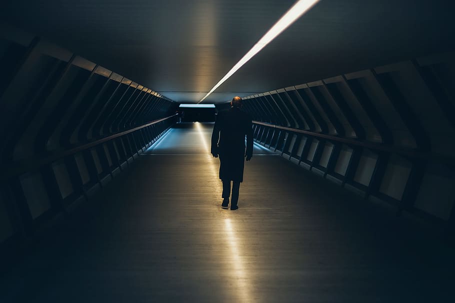 Man on Escalator in Illuminated Room, alone, evening, light, shadow HD wallpaper