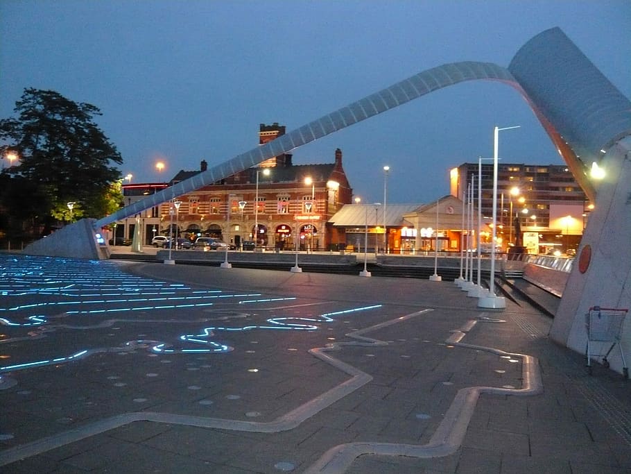 Millennium Square by night, showing the Time Zone Clock in Coventry, England