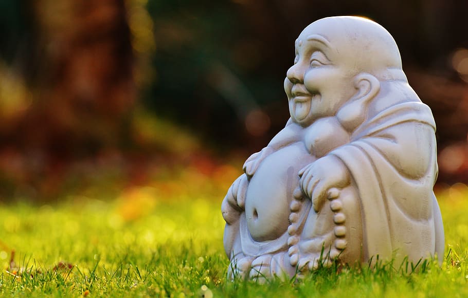 Buddha ceramic statue on green grass field, figure, rest, buddhism, HD wallpaper