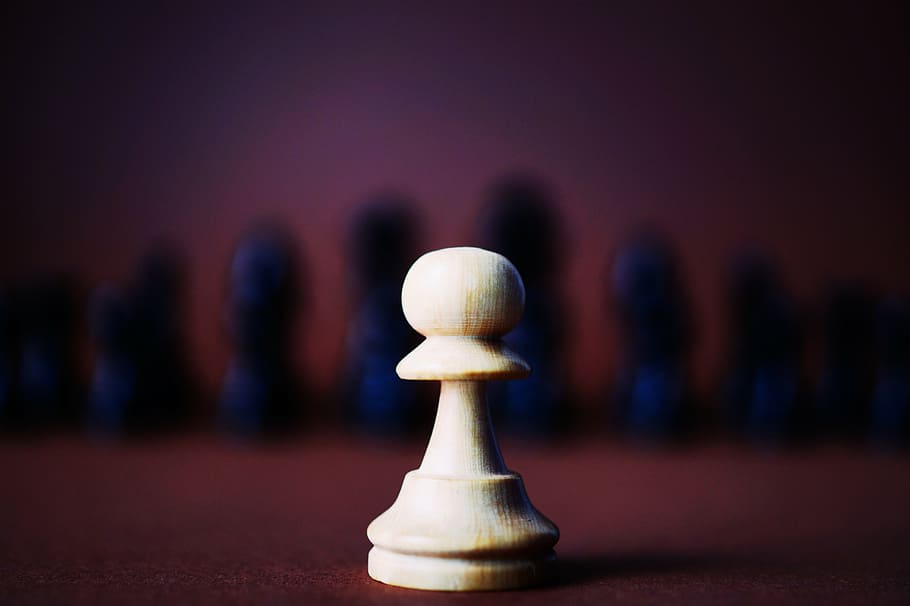 close-up photo of chess piece, game, black, white, pawn, sport